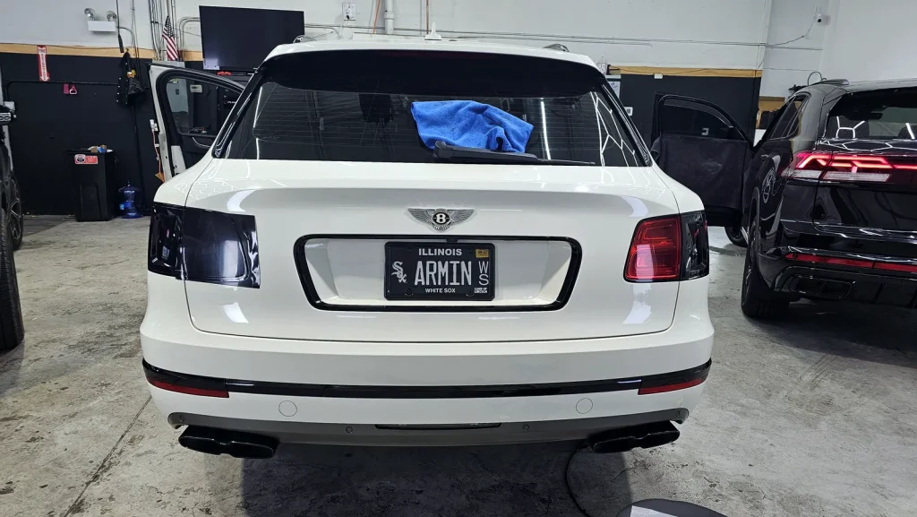 White Bentley Bentayga with smoked tinted taillights