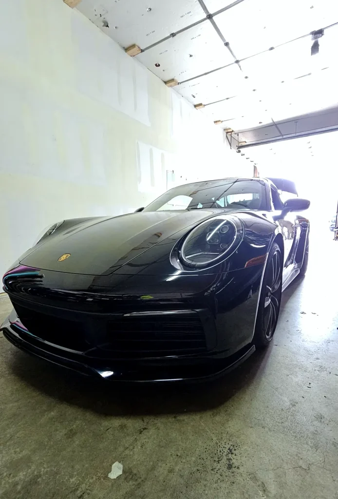 Gloss black Porsche 911 with a protected, high-gloss finish