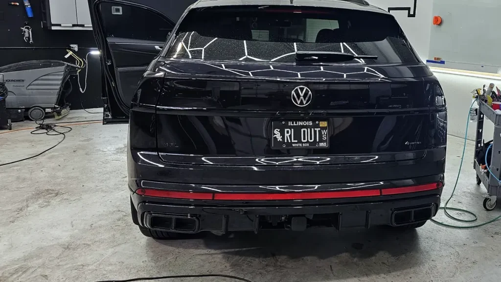Winter paint protection film on a black Volkswagen Atlas in the MLUX bay