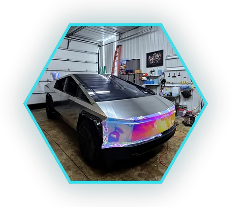 Tesla Cybertruck showing a color-shift vinyl wrap finish