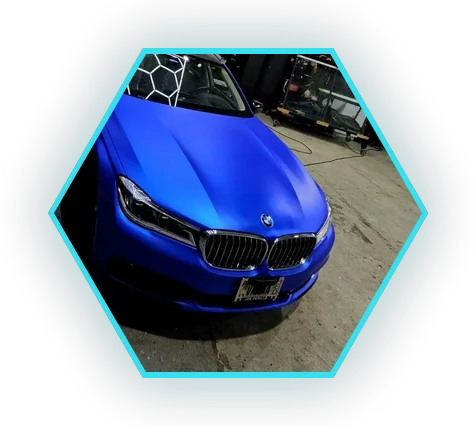 Matte blue BMW showing a matte vinyl wrap finish