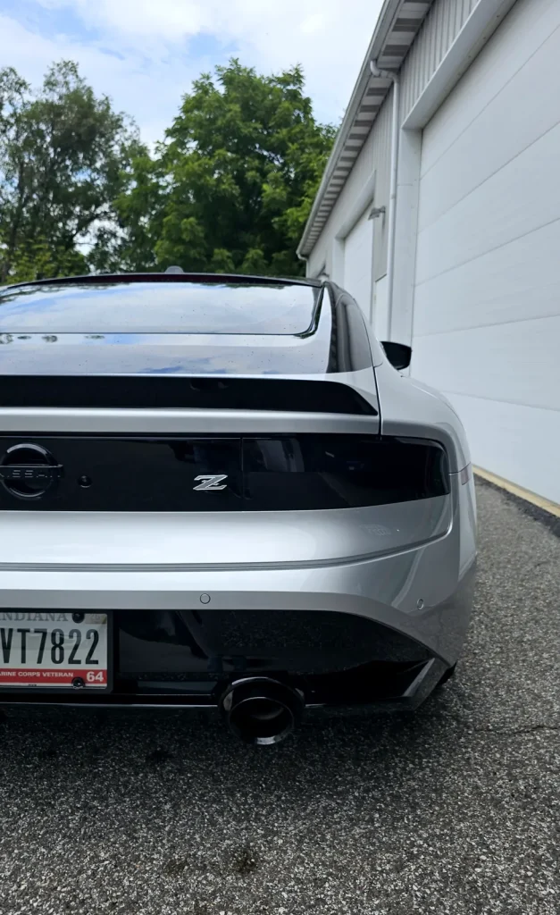 Silver Nissan Z with tinted taillights