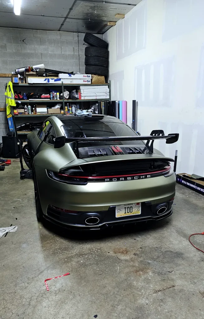Satin wrap finish on a green Porsche 911 GT3