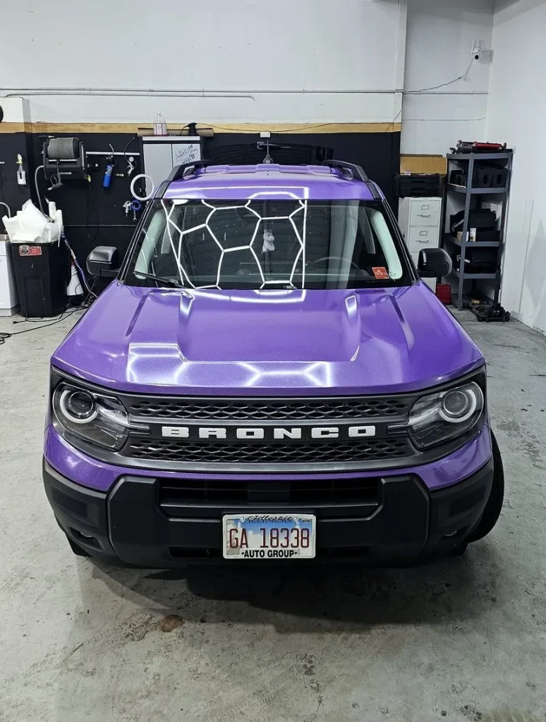 Ford Bronco Sport after a purple color-change wrap, front view