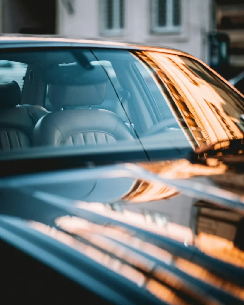 Close-up of a tinted car side window