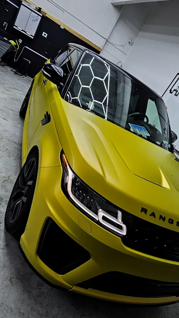 Range Rover Sport SVR in a metallic yellow wrap